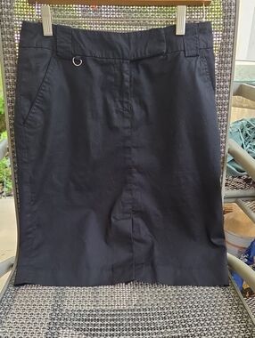 Kenar,classic black pencil,skirt with 4 pockets,and belt loops.